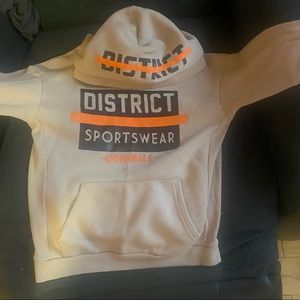 Tan sweater and pants